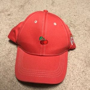 Cute Coral colored hat with cherry on it
